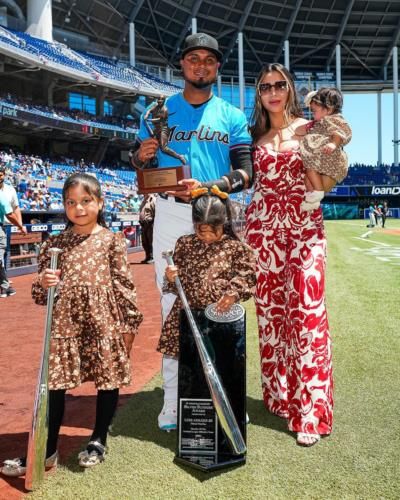 Luis Arraez Celebrates Success With Family On Baseball Field