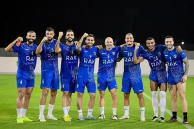 Andrés Iniesta And Team Embrace Unity In Team Photo