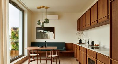 Designers are in Love With the Trend of "Communal" Kitchen Seating — 'It Brings Families Together'