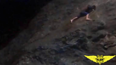 “Don't let go” – dramatic helicopter rescue footage shows barefoot California hiker clinging to cliff