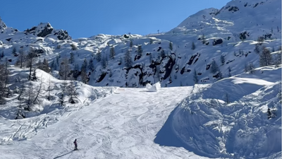 Watch as helicopter accidentally drops runaway metal canister onto busy ski slope