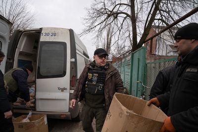 A mayor in Ukraine aids his town's few remaining people, as Russia closes in