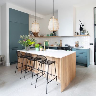 This light and airy family kitchen blends colour and texture to create and inviting modern space