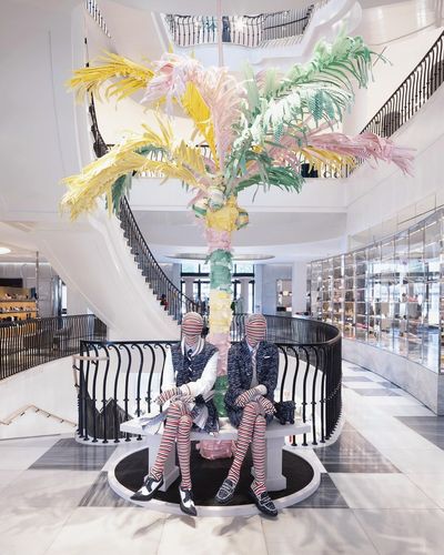 Thom Browne Transforms Saks into an Oasis With a Seersucker Palm Tree, a Fountain and a Garden