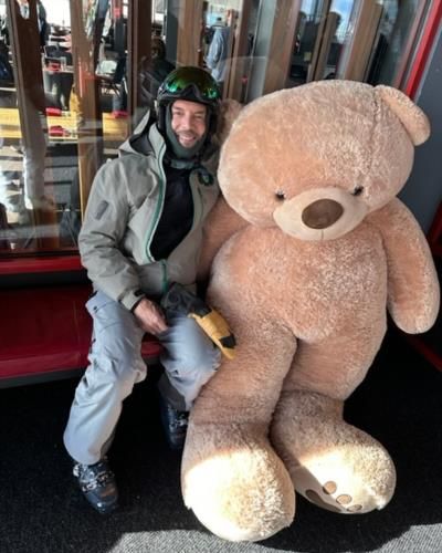 Tony Horton Playfully Poses With Oversized Teddy Bear