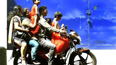 Failure to wear helmet | Madras High Court deducts ₹13.42 lakh from compensation to family