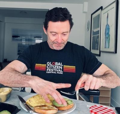 Hugh Jackman Savors A Delightful Meal In A Captured Moment