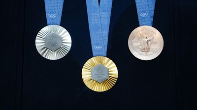 History of Olympic gold, silver and bronze glitters in Paris museum