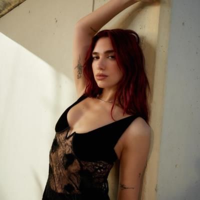 Dua Lipa Stuns In Bold Black Photoshoot With Fellow Models