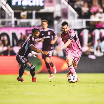 Lionel Messi's Dynamic Performance In Pink Jersey