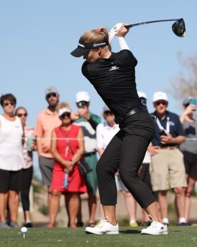 Brooke Henderson Shines In Black On The Golf Course