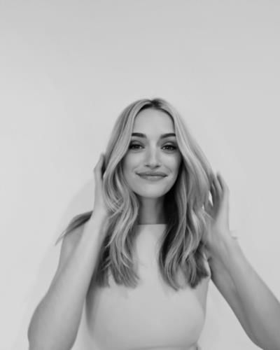 Captivating Beauty: Brianne Howey's Timeless Elegance In Monochrome