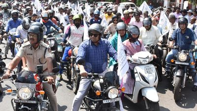 District administration officials take out bike rally to create voting awareness among youth