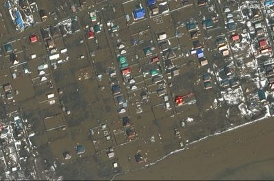Russia Says Flood Situation 'Difficult' As More Rivers Burst