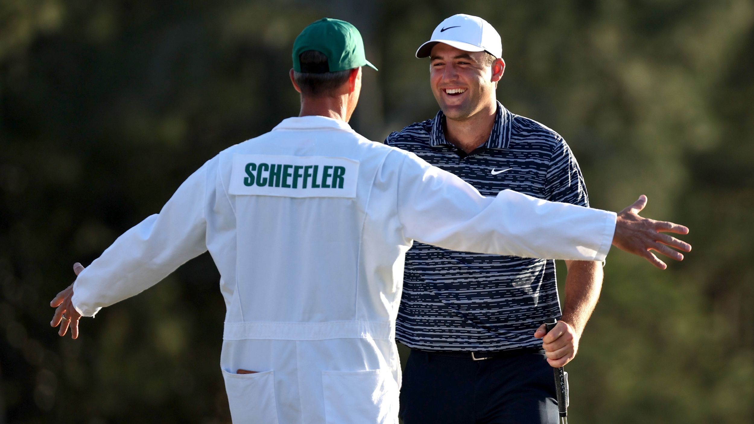 Why Do Caddies Wear White Jumpsuits At The Masters?