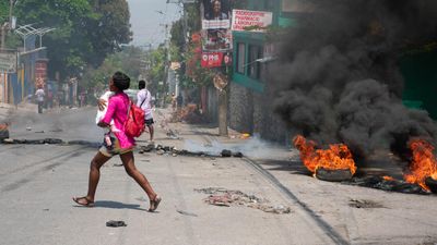 Haiti decrees creation of transition council as tens of thousands flee capital