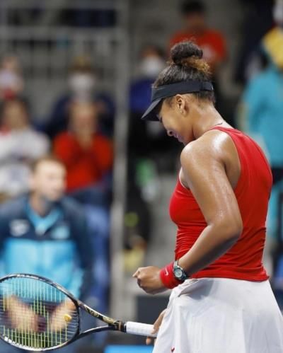 Naomi Osaka's Triumphant Moment On The Tennis Court