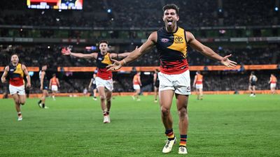 Crows rally to beat Blues for first win of the season
