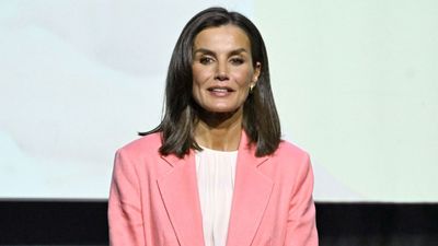 Queen Letizia stuns in a striking coral linen suit - this eye-catching colour is one of our favourites for spring