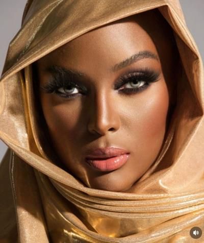 Amara La Negra: Radiant Beauty In Gold