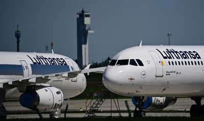 Lufthansa Reports Loss, Cuts Outlook After Strikes
