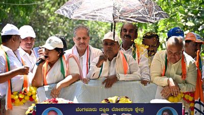 Candidates sweat it out in sweltering heat to connect with voters