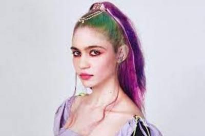 Grimes Apologizes For Technical Issues During Coachella Performance, Vows Improvement