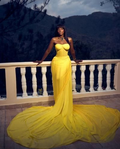 Amara La Negra Radiates Elegance In Stunning Yellow Dress