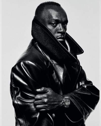 Usain Bolt: Iconic Elegance And Charisma In Monochrome Portrait