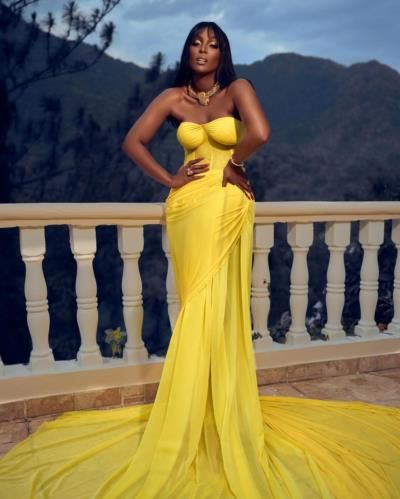 Amara La Negra Radiates Elegance In Yellow Dress