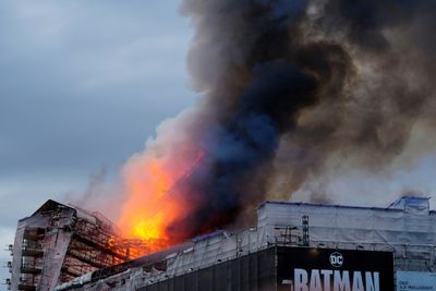 Massive Fire Topples Spire At Copenhagen's Historic Stock Exchange
