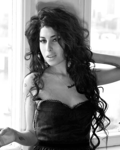 Amy Winehouse: Iconic Style And Fearless Confidence