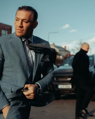 Conor Mcgregor's Timeless Sophistication In Classic Grey Suit