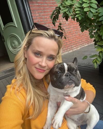 Reese Witherspoon Celebrates The Joy Of Pet Ownership