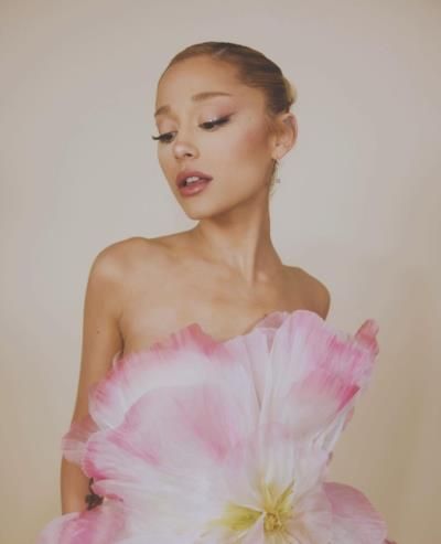 Ariana Grande Stuns In Floral Pink Ensemble With Graceful Presence
