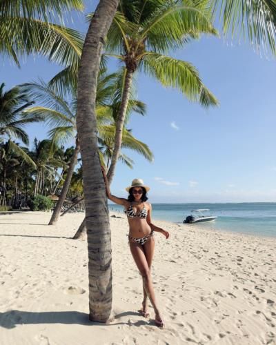 Clémence Botino Radiates Tropical Charm In Beach Bikini Photos