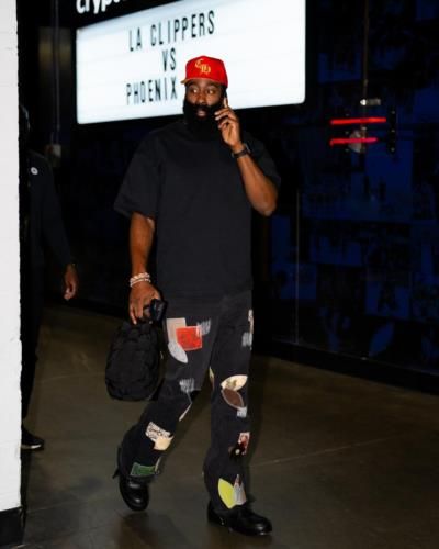 James Harden's Stylish Black Outfit With Printed Pants And Cap
