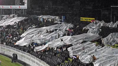 'Aur inhe Champions Trophy host karni hai': With rain and no roof, Pakistan cricket fans forced to go under plastic sheets for shelter