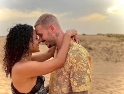 Intimate Moments: Christina Milian And Partner's Joyful Connection