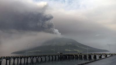 Indonesia evacuates thousands as ash spreads around erupting volcano