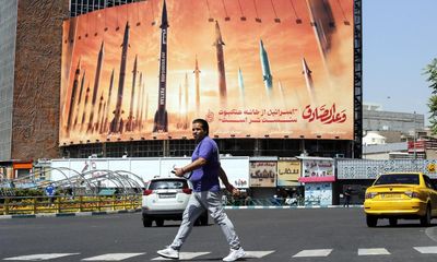 Iran plays down impact of Israeli airstrikes but remains on high alert