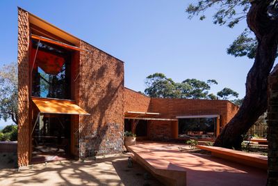 Burnt Earth Beach House is an experimental retreat crafted in terracotta