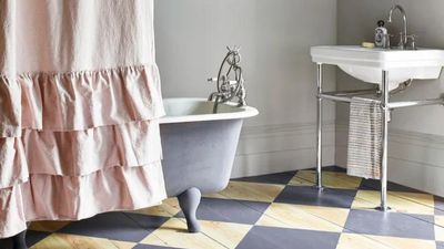 10 small bathroom flooring ideas perfect for enhancing compact spaces, from "fun and functional" to "dark and moody"