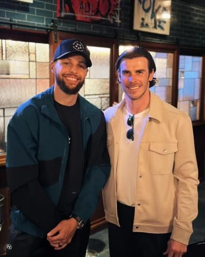 Athletic Camaraderie: Gareth Bale And Stephen Curry Strike A Pose