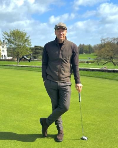 John Terry Displays Grace While Posing With Golf Club.