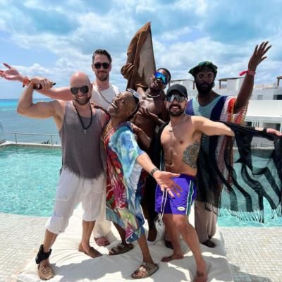 Billy Porter Radiates Style And Confidence Poolside With Friend