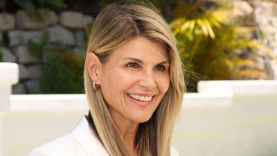 Lori Loughlin’s indoor-outdoor living room is a masterclass in a quiet luxury color scheme that is dominating in 2024