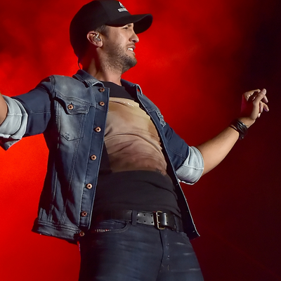 Luke Bryan Trips Over a Fan's Phone During a Show, Jokes "My Lawyer Will Be Calling"