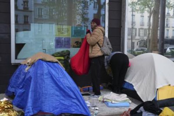 Paris Police Evict Migrants Near River Seine Ahead Of Olympics
