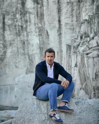 Luis Figo Stands Tall In Majestic Rocky Setting